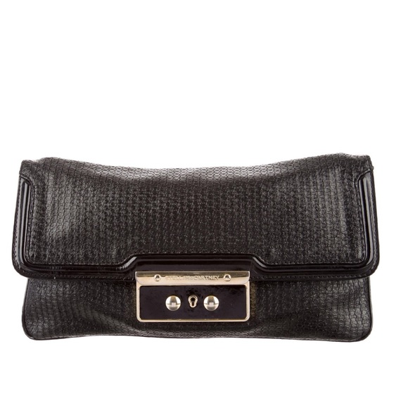 Stella McCartney Handbags - 💕HP💕Stella McCartney black faux leather and gold clutch